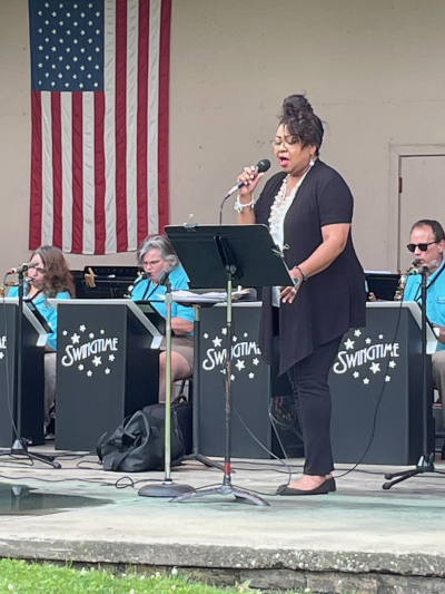 rachell singing with band